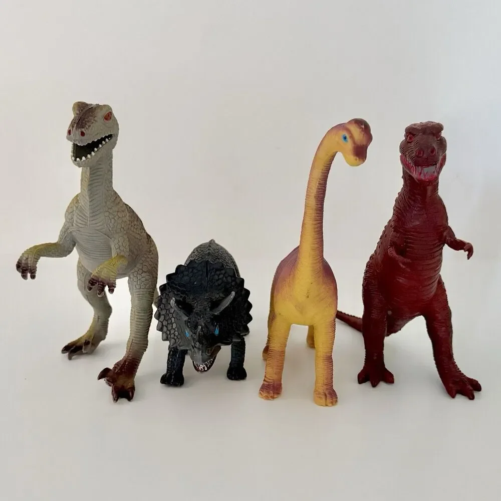 Lot of 4 Vintage Assorted Dinosaurs Plastic/Rubber Embossed - Up to 8.5
